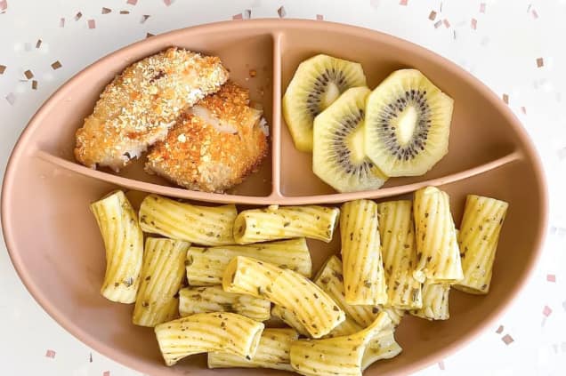 infant eating solids independently