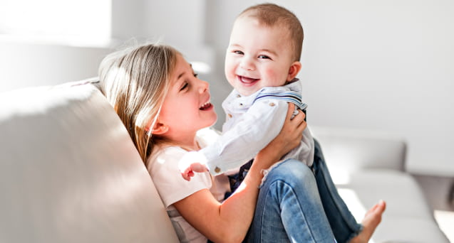 Nurturing toddler new baby