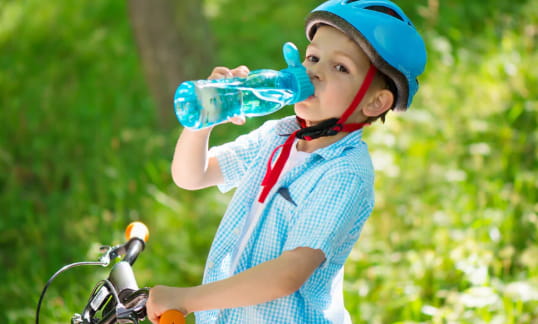 toddler drinking water summer