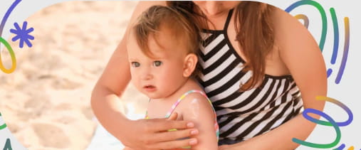 Applying sunscreen to infant