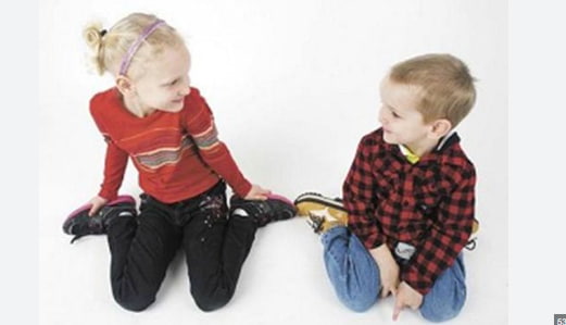 happy toddler tailor sitting